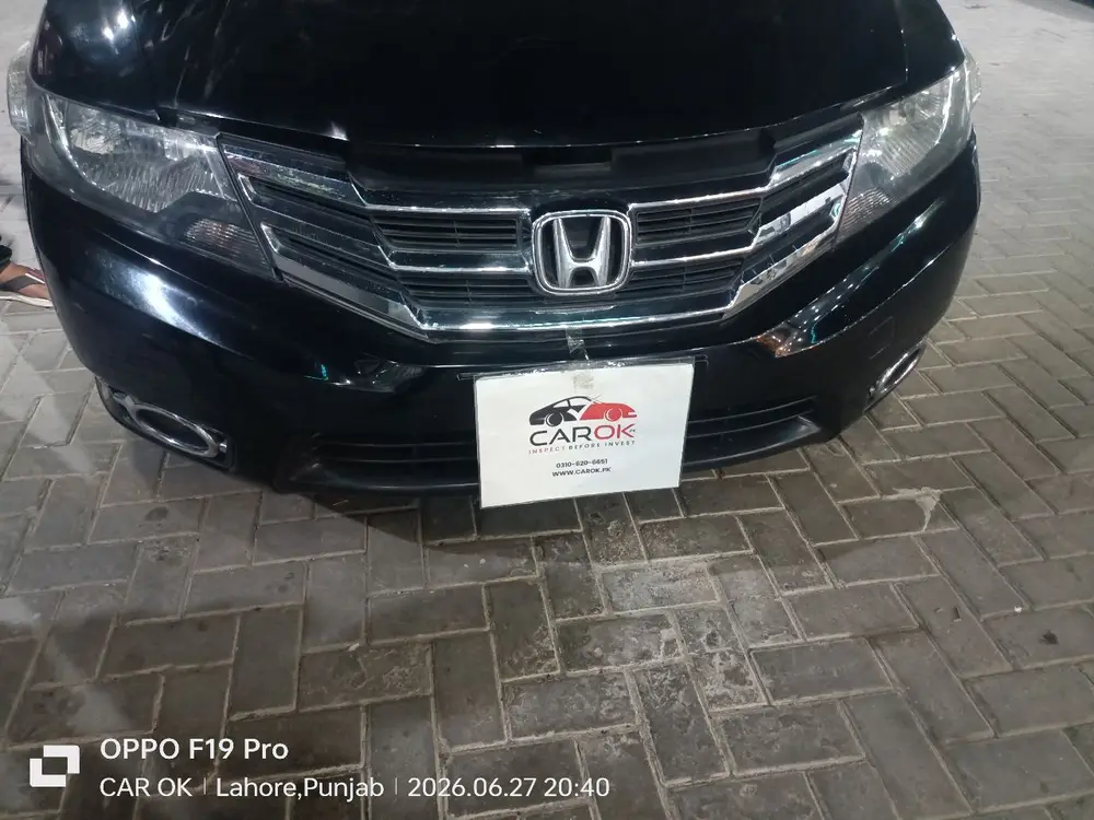 Under CarOK inspection (our board covers the plate) — straight body, strong mechanicals