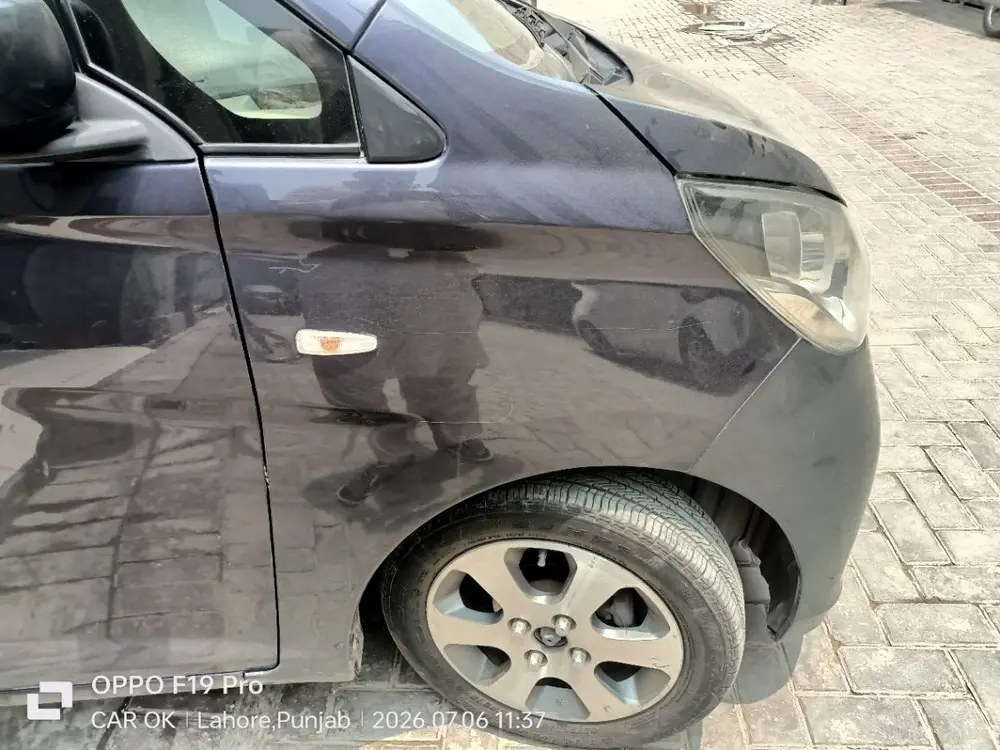 Deep scratch across the front fender