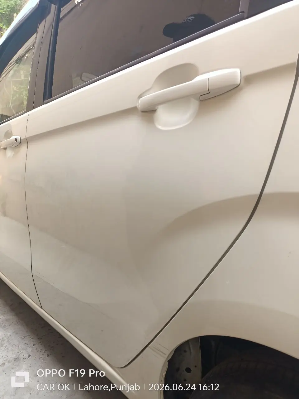 Rear door — one of 26 exterior findings mapped in the report